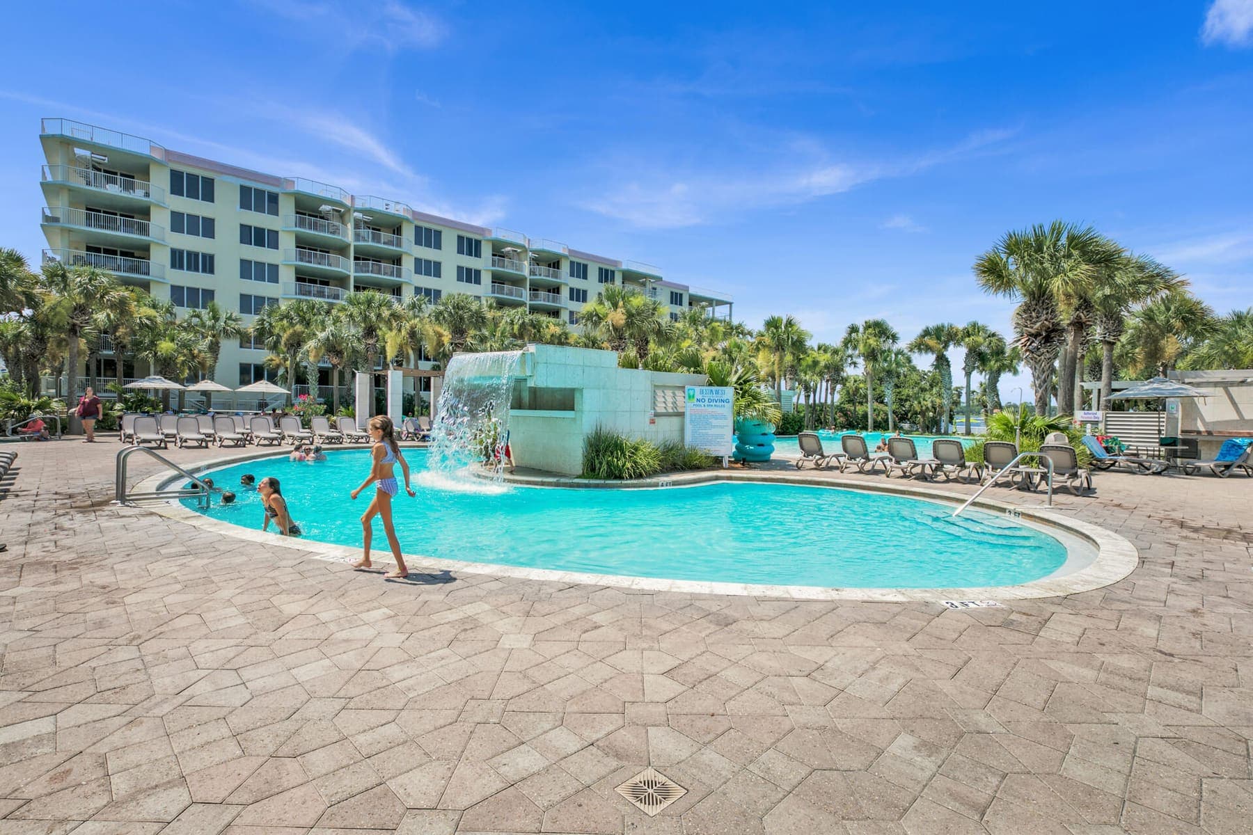 Poolside waterfall wall on the resort’s bayside pool